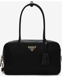 Prada - Medium Re-Nylon And Leather Top Handle Bag - Lyst