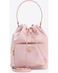 Prada - Triangle Logo Nylon Bucket Bag - Lyst