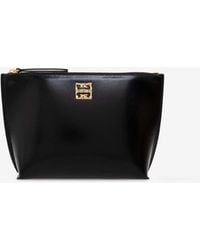 Givenchy - 4G Liquid Leather Pouch Bag - Lyst