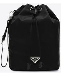 Prada - Triangle Logo Re-Nylon Bucket Bag - Lyst