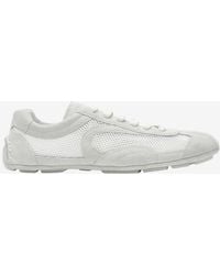 Prada - Lace-Up Low-Top Sneakers - Lyst