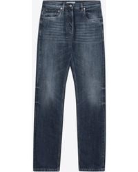 Prada - Logo Patch Washed-Out Jeans - Lyst