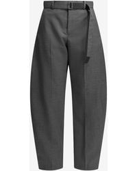 Sacai - Curved-Leg Tailored Wool Pants - Lyst