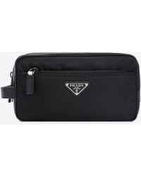 Prada - Triangle Logo Re-Nylon And Saffiano Leather Pouch Bag - Lyst