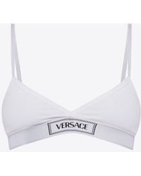 Versace - Logo-Embroidered Ribbed Bra - Lyst
