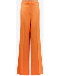 Stella McCartney - Pressed-Crease Flared Pants - Lyst