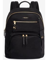 tumi black and gold backpack