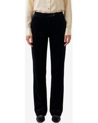 KHAITE - Hunter Slim Velvet Pants - Lyst
