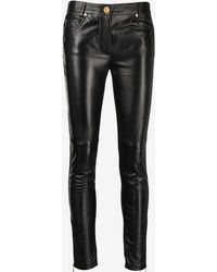 Versace - La Greca Skinny Leather Pants - Lyst