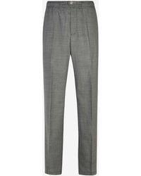 Versace - Tapered-Leg Houndstooth Wool Pants - Lyst