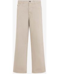 Prada - Logo Patch Straight-Leg Jeans - Lyst