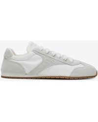 Prada - Leather Low-Top Sneakers - Lyst