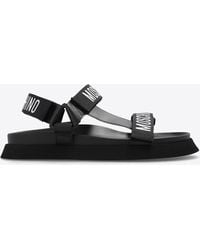 Moschino - Logo-Tape Flat Sandals - Lyst