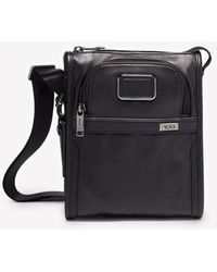 tumi slim messenger bag