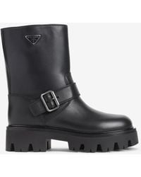 Prada - Triangle-Logo Leather Lug Boots - Lyst