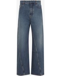 Alaïa - Twisted Straight-Leg Jeans - Lyst