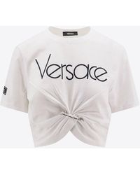 Versace - Logo Print Safety Pin Cropped T-Shirt - Lyst