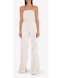 alexis raine flared satin jumpsuit
