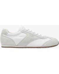 Prada - Leather Low-Top Sneakers - Lyst