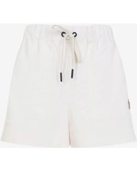 Moncler - Logo Patch Mini Shorts - Lyst