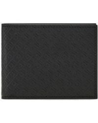 Ferragamo - Monogram Embossed Bi-Fold Wallet - Lyst