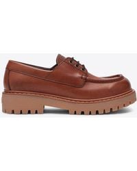Prada - Leather Loafers With Embossed-Logo - Lyst