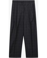 Prada - Wool Checked Pants - Lyst