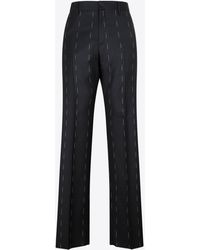 Givenchy - All-Over Logo Tailored Wool Pants - Lyst