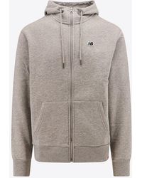 New Balance - Logo Embroidered Zip-Up Hoodie - Lyst
