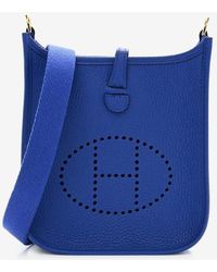 HERMÈS MINI EVELYNE BAG IN CAPUCINE CLEMENCE LEATHER WITH