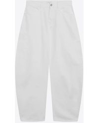 Alaïa - Low-Rise Rounded Pants - Lyst