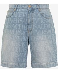 Versace - All-Over Logo Denim Shorts - Lyst