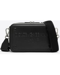 Dolce & Gabbana - Logo-Embossed Leather Messenger Bag - Lyst