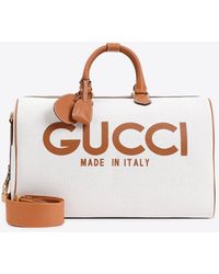 Gucci - Large Logo-Printed Duffel Bag - Lyst