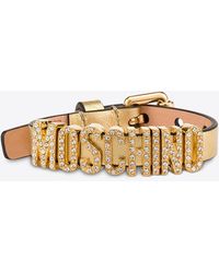 Moschino - Crystal Embellished Logo Metallic Leather Bracelet - Lyst