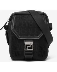 Versace - All-Over Logo Jacquard Messenger Bag - Lyst