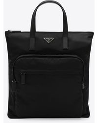 Prada - Triangle Logo Re-Nylon And Leather Top Handle Bag - Lyst