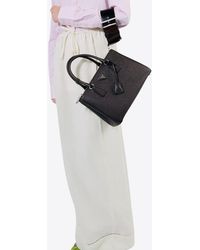 Prada - Logo-Embroidered Maxi Skirt - Lyst