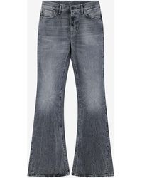 Acne Studios - Logo Patch Faded Flared Jeans - Lyst