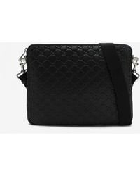 Gucci - Medium Gg Embossed Leather Messenger Bag - Lyst