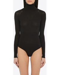 Alaïa - Knitted Turtleneck Bodysuit - Lyst