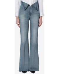 McQueen - Washed Flared Jeans - Lyst