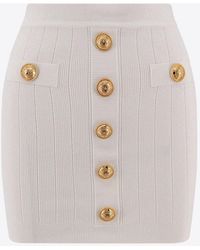 Balmain - Button-Embellished Mini Knit Skirt - Lyst