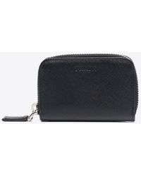 Prada - Debossed Logo Leather Zip Wallet - Lyst