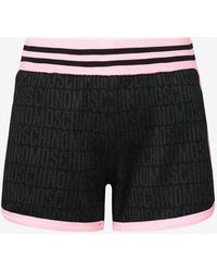 Moschino - All-Over Logo Track Shorts - Lyst