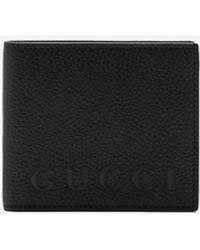 Gucci - Logo Embossed Grained Leather Bi-Fold Wallet - Lyst