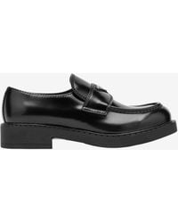 Prada - Triangle Logo Brushed Leather Loafers - Lyst