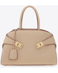 Ferragamo - Medium Hug Leather Top Handle Bag - Lyst