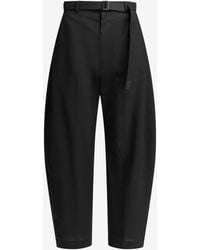 Sacai - Curved-Leg Tailored Wool Pants - Lyst