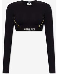 Versace - Logo Waistband Long-Sleeved Crop Top - Lyst